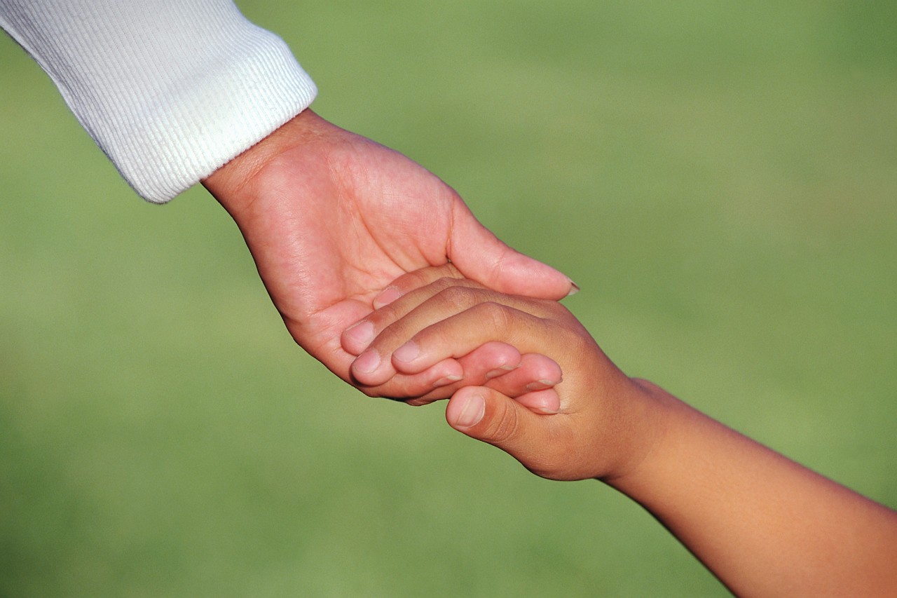 Mother Holding Child's Hand